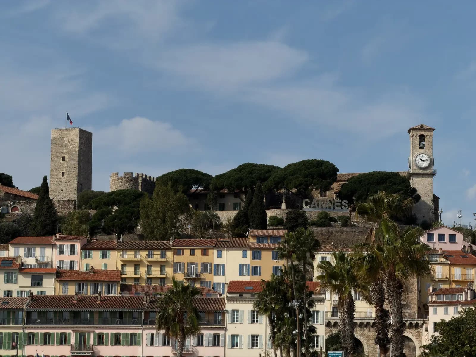 Le Suquet with its medieval tower and church bell tower above the rooftops