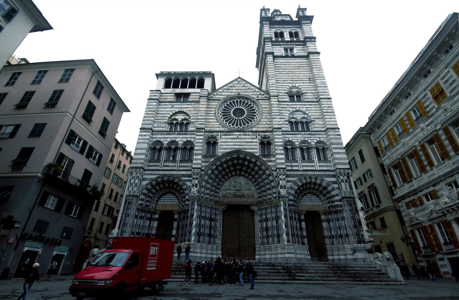 The white and black striped marble façade of San Lorenzo Cathedral in Genoa